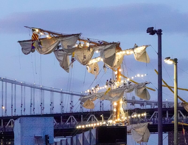 Sailors on the masts of the Cuauhtemoc, a Mexican Navy training boat, as it sits in the East River after the ship hit the Brooklyn Bridge in New York. Photograph: EPA