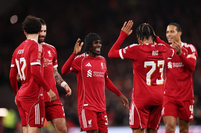 Jeremie Frimpong of Liverpool celebrates with team-mates. Photograph: Carl Recine/Getty
