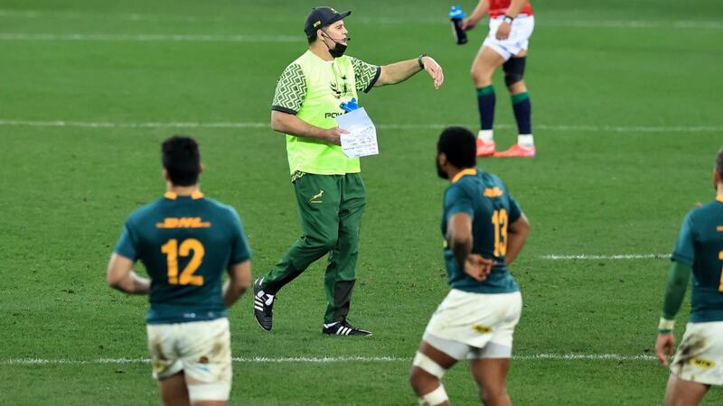 Rassie Erasmus, the South Africa  director of rugby, acts as a water carrier as he instructions during the first Test. Photograph: David Rogers/Getty Images