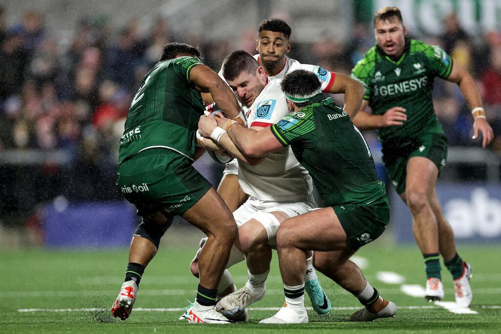 Ulster's Nick Timoney is tackled by Tadgh McElroy and Denis Buckley of Connacht. Photograph: Laszlo Geczo/Inpho