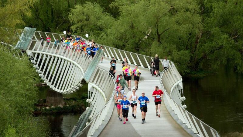 Living bridge: the Barrington’s Hospital Great Limerick Run started at the People’s Park surrounded by Georgian Limerick and wound its way through historical, sporting and cultural sites, such as the Treaty Stone and Thomond Park Stadium before finishing on  O’Connell Street. Photograph: Seán Curtin/FusionShooters