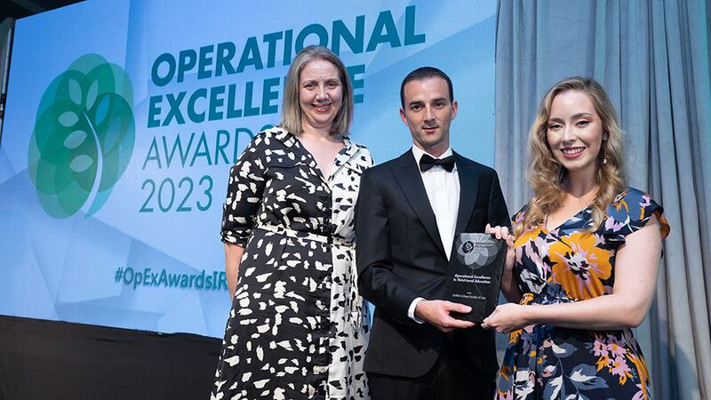 Peter Flanagan, finance director at ISS Facility Services Ireland, presents the operational excellence in third level education award to Karen Sutton and Shauna Colgan, Griffith College Faculty of Law