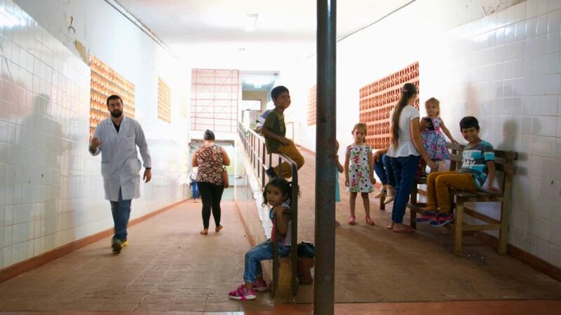 Patients wait to see doctors in the hallways of a women and children’s hospital in Ciudad del Este. Healthcare professionals face challenges providing adequate care outside the capital. Photograph: Kait Bolongaro
