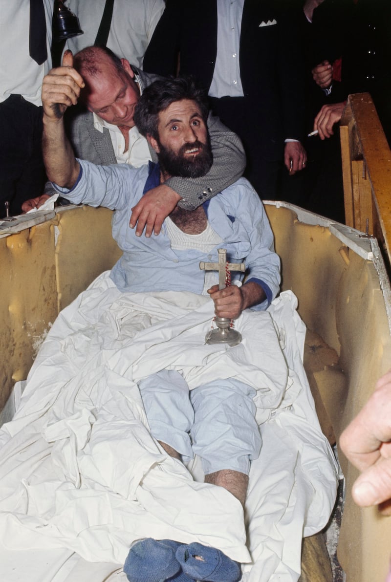 Beo Faoin bhFód: Michael Meaney sits in his coffin after completing 61 days underground. Photograph: UPI/Bettmann Archive/Getty