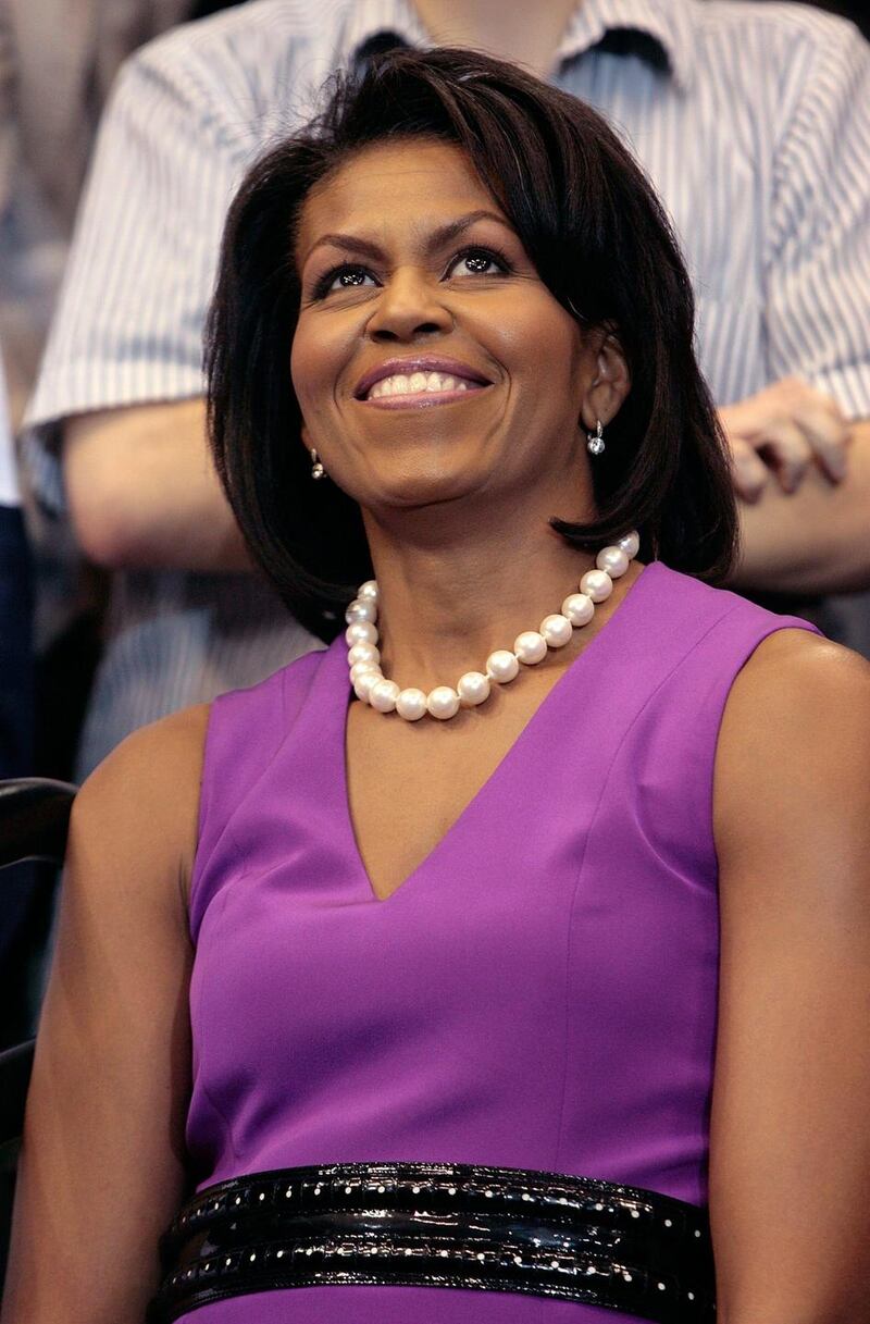 Michelle Obama in a brighter hue, during her husband’s first presidential campaign, 2008. Photograph:  Chip Somodevilla/Getty Images