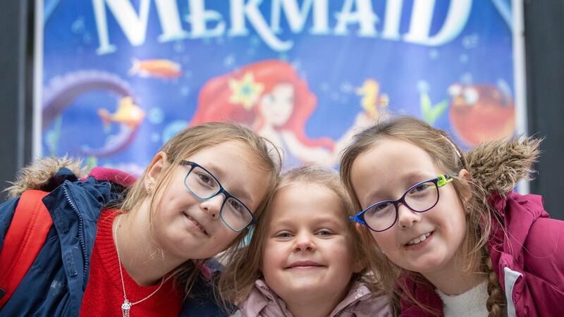 Friends, from left, Mia Sokolwski, Haily Gdowska and Julia Sokolwski from Portlaoise before the start of The Little Mermaid pantomime. Photograph: Tom Honan