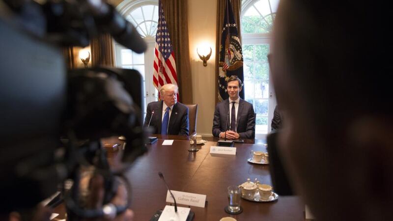 Security threat: Donald Trump with his son-in-law, Jared Kushner, whose top-secret clearance has been downgraded to secret. Photograph: Tom Brenner/New York Times