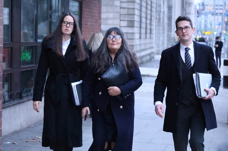 Martina Burke, the mother of Enoch Burke, leaving the Court of Appeal in Dublin on Thursday, accompanied by his sister Ammi and brother Isaac. Photograph: Collins