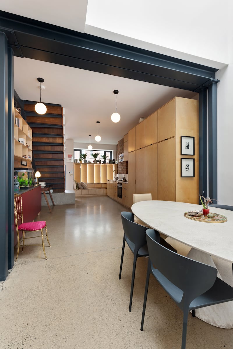 Dining area connects to kitchen. Photograph: Viv van der Holst