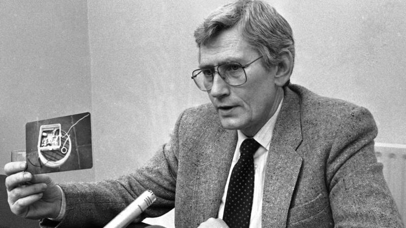 File photograph of  former SDLP deputy first minister Seamus Mallon holding up a picture taken of the bugging equipment found in his Dublin residence. A dinner in honour of Mr Mallon was attended by hundreds in Armagh. Photograph: Kevin McMahon/The Irish Times