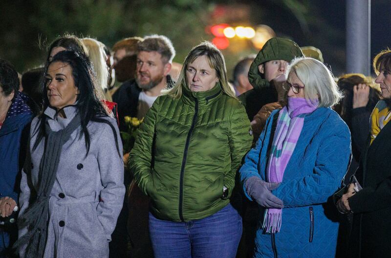 Granddaughter of James Moore, who was the owner of the Rising Sun pub,  Amanda Logue (centre) during a vigil to mark the 30th anniversary of the Greysteel shooting. Photograph: Liam McBurney/PA Wire