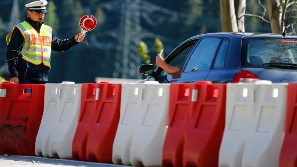 A policeman stops a car at the German-Austrian border near Mittenwald, southern Germany. Germany temporarily reinstalled controls on Schengen borders with its neighbours ahead of the G7 summit. Photograph: Michael Dalder/Reuters