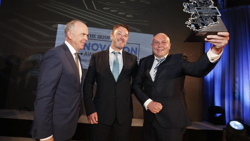‘Irish Times’ managing director Liam Kavanagh presents the overall Irish Times Innovation award to John Browne and Dr James Kennedy from Kastus at the Irish Times Innovation Awards last year. Photograph:  Conor McCabe
