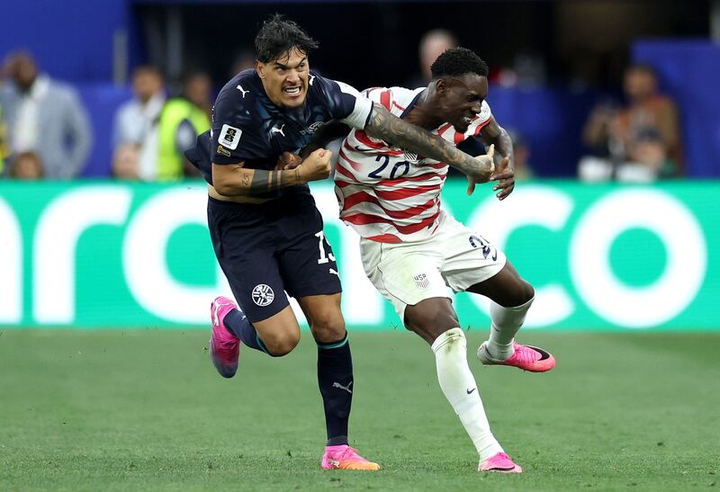 Folarin Balogun (right) of USA in action against Gustavo Gomez of Paraguay during the Fifa World Cup 2026 group stage match in Los Angeles. Photograph: EPA