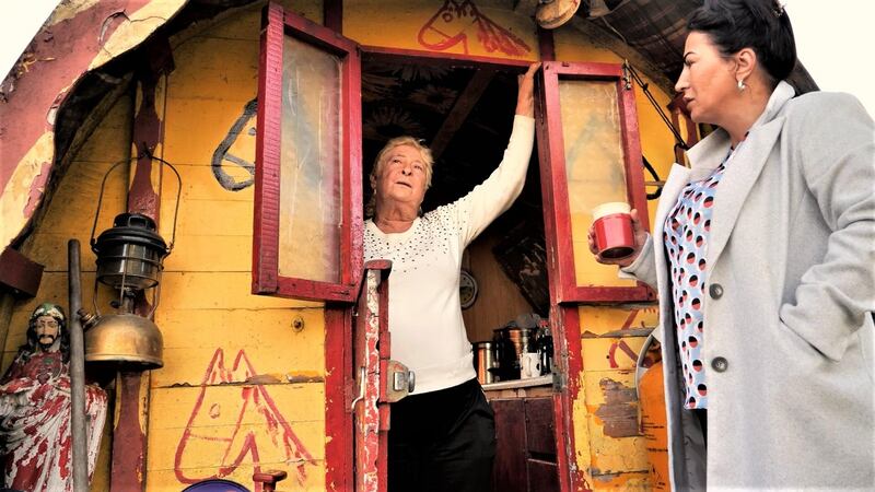 Nelly Reilly with Mags Casey at the Reillys’ barrel-top wagon. Photograph: Martin Beanz Warde
