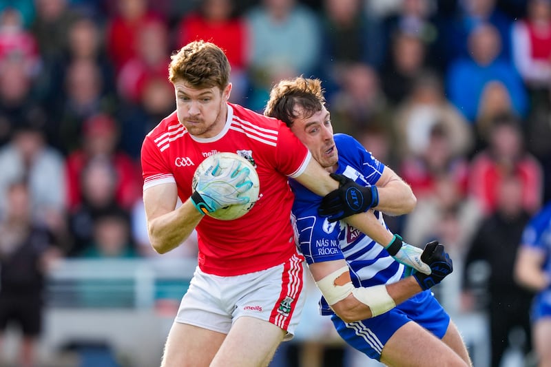 Athy vs Naas: Kevin Feely of Athy and Paul McDermott of Naas contest the ball during the Kildare Senior Football Championship Final in October: Photograph: Inpho