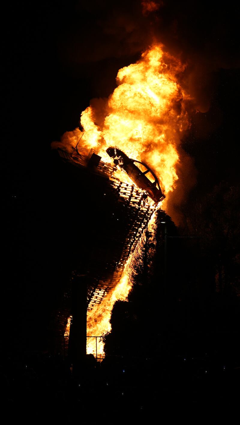 A mock police car is set alight on top of a bonfire in Moygashel near Dungannon, Co Tyrone. Photograph: Niall Carson/PA