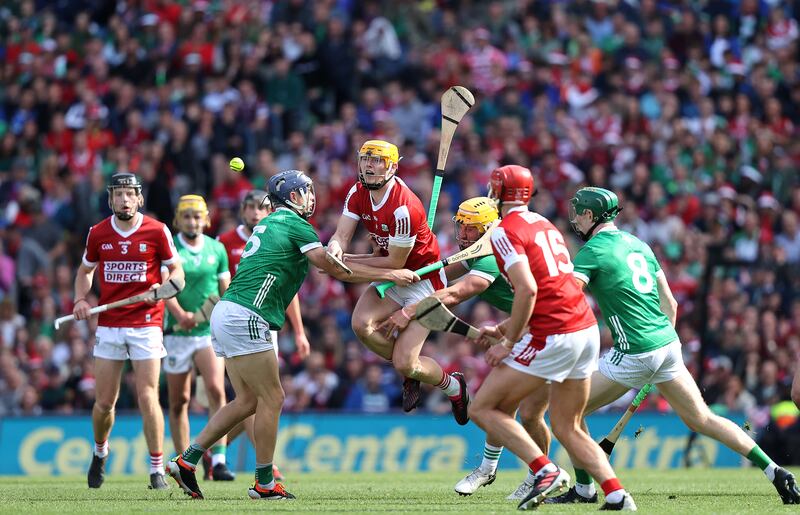 Cork's Shane Barrett comes up against Diarmaid Byrnes and Tom Morrissey of Limerick during the All-Ireland semi-final at Croke Park. Photograph: Bryan Keane/Inpho