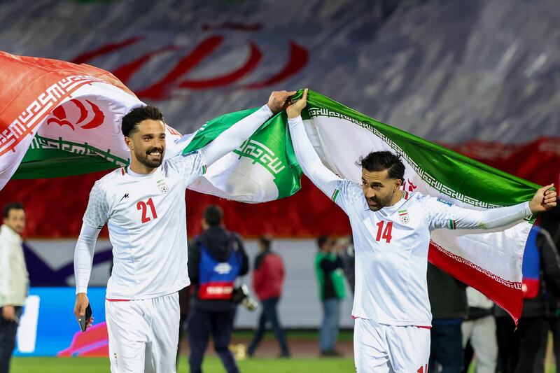 Iran's players Omid Norafkan and Saman Ghoddos celebrate. Phootgraph: AFP via Getty