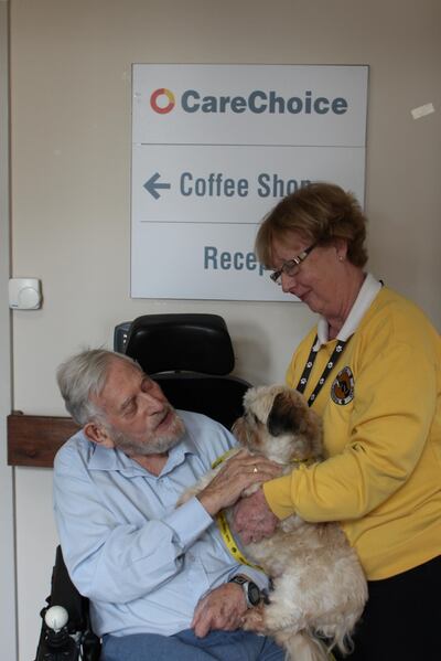 George Bannister, with Bernie Ladd from Irish Therapy Dogs, and Elton.