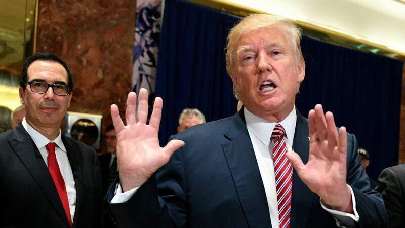 Donald Trump speaks to the press  in Trump Tower, New York. Photograph: Jim watson/AFP/Getty.
