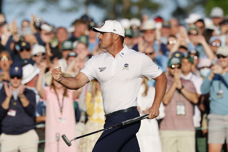 Bryson DeChambeau of the US reacts after sinking a birdie putt on the 18th green. Photograph: Erik S Lesser/EPA-EFE