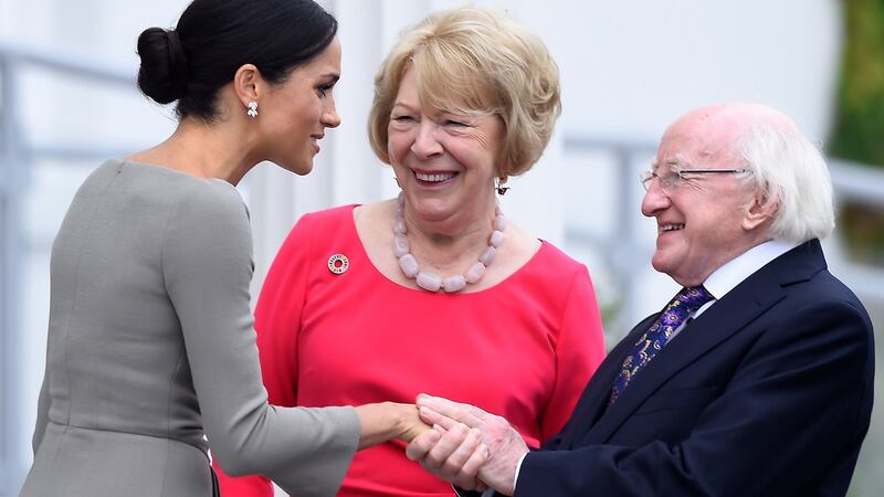 Britain’s  Duchess of Sussex meets  President Michael Higgins and his wife Sabina. Photograph: Clodagh Kilcoyne/ Pool/Getty