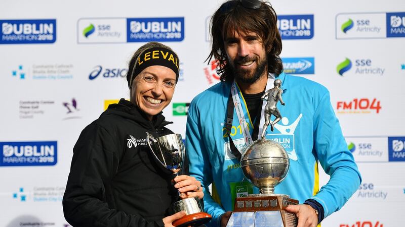 Lizzie Lee and Mick Clohisey after finishing third and sixth respectively in the Dublin Marathon. Photograph: Ramsey Cardy/Sportsfile