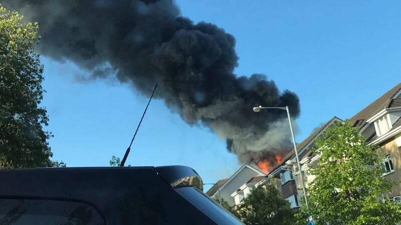 A fire took hold at the Verdemont apartment block off the Snugborough Road in Blanchardstown at about 6.15pm on Wednesday. Photograph: Dublin Fire Brigade/Twitter