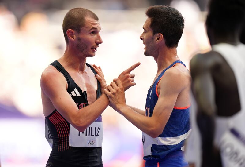 Point of difference: Britain's George Mills and France's Hugo Hay following the men's 5000m Olympic heats earlier this week. Photograph: Martin Rickett/PA Wire