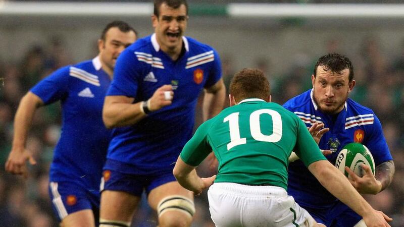Ireland's Paddy Jackson tackles France’s Thomas Domingo during the Six Nations match at the Aviva.  Photograph: Reuters/Cathal McNaughton