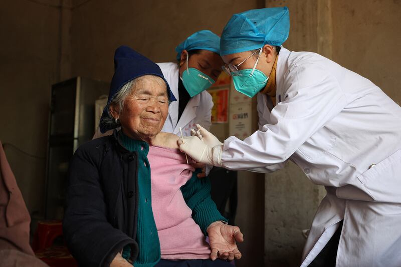 A resident receives a Covid-19 vaccine in Danzhai county, Qiandongnan Miao and Dong Autonomous Prefecture, in China's southwestern Guizhou province on Monday. Photograph: STR/AFP via Getty Images