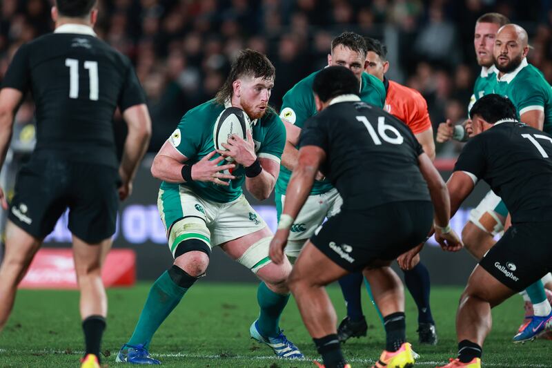 Ireland's Joe McCarthy comes up against New Zealand's Asafo Aumua. Photograph: Craig Butland/Inpho
