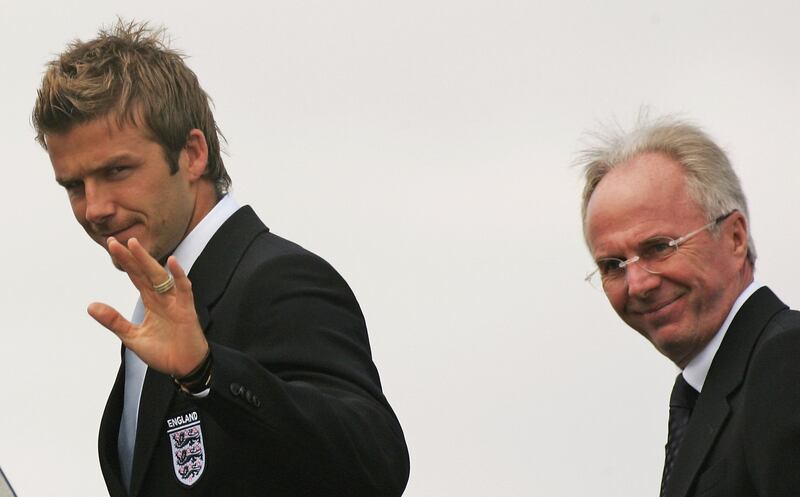 England captain David Beckham waves as he and manager Sven-Göran Eriksson board their plane at Luton Airport to travel to Germany for the 2006 World Cup. Photograph: Scott Barbour/Getty Images