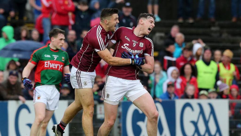 Galway’s Thomas Flynn celebrates with Damien Comer after scoring the winning goal in the Connacht football semi-final againt Mayo. Photograph: Lorraine O’Sullivan/Inpho