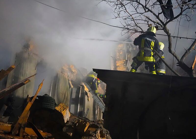 Firefighters work after a Russian attack in Odesa. Photograph: Ukrainian Emergency Services/AP