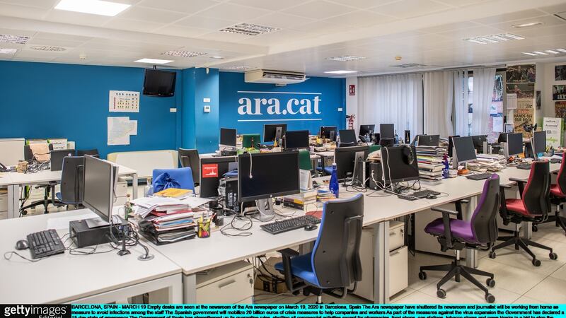 Empty desks are seen at the newsroom of the Ara newspaper  in Barcelona, Spain. Photograph: David Ramos/Getty Images