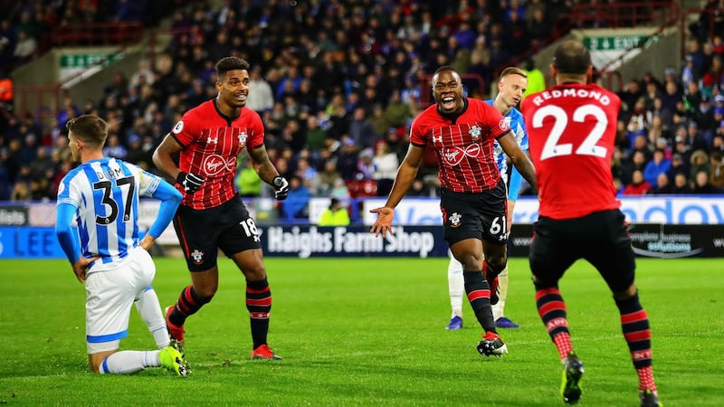 Michael Obafemi celebrates scoring his first Premier League goal agaisnt Huddersfield. Photograph: Chris Brunskill/Fantasista/Getty Images