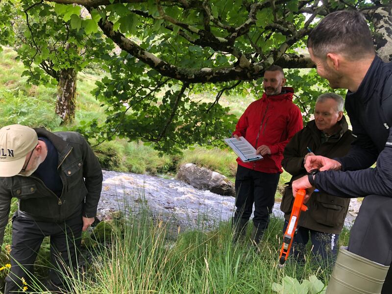 Downstream investigating changes to the waterway and its banks by the Inishowen River Trust in County Donegal