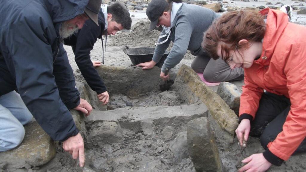 Volunteers excavate the box-like archeological structure on Coney Island. The site may date back 4,000 years