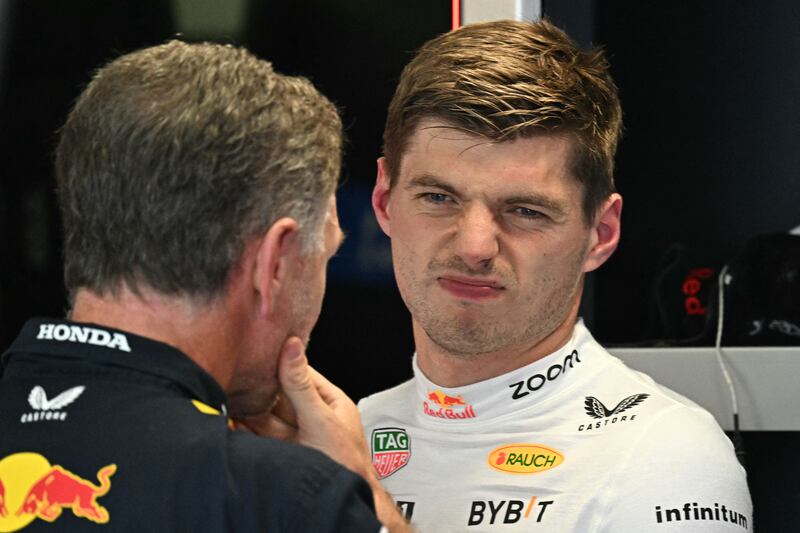 Red Bull's team principal Christian Horner (left) and driver Max Verstappen after the third practice ahead of the qualifying session for Sunday's Italian Grand Prix. Photograph: Gabriel Bouys/AFP via Getty