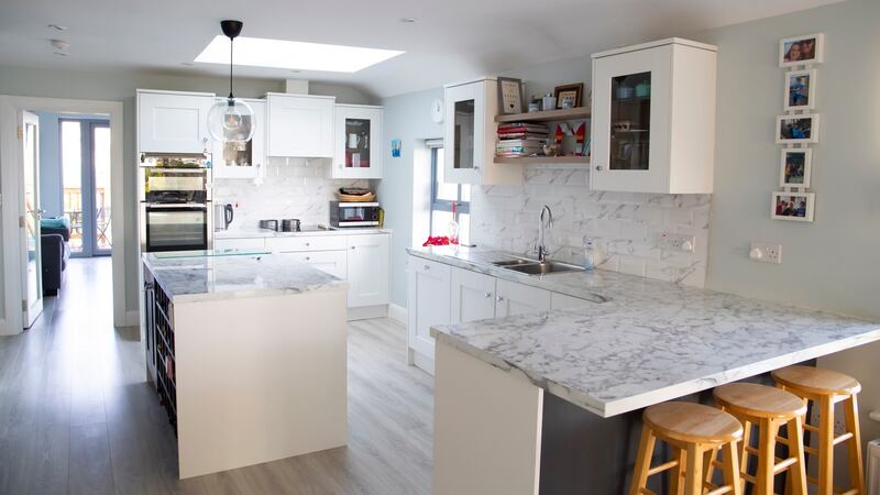 “We now have an amazing kitchen with loads of storage as well as an island and the room is now very functional, whereas previously the kitchen was tiny.”   Photograph: Patrick Browne