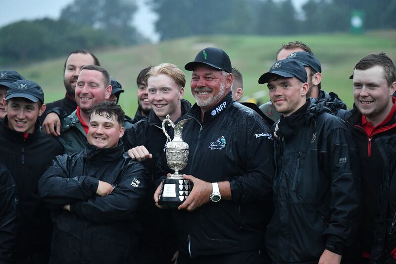 Darren Clarke with the trophy and the greenkeepers after his victory in last year's Senior Open at Gleneagles  Auchterarder, Scotland. Photograph: Mark Runnacles/Getty Images 