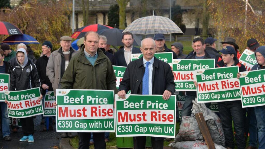 Henry Burns, national livestock chair IFA, and Eddie Downey (centre-right), president IFA, at the 48-hour protest outside Kepak in Clonee. Photograph: Alan Betson/The Irish Times