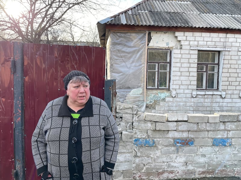 Retired schoolteacher Olha Fateeva, whose house in Chkalovske had its windows blown out and front wall badly damaged when a shell landed in her yard in 2022. Photograph: Daniel McLaughlin