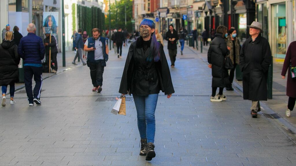 Shoppers  amid the  pandemic on Monday on Grafton Street, Dublin. “We can’t conclude we have turned the corner in Dublin even if we can see the growth rate is different to what it was,”  chief medical officer Dr Tony Holohan said. Photograph: Gareth Chaney/Collins