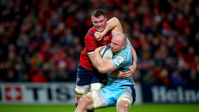 Munster’s Peter O’Mahony tackles h Matt Kvesic of Exeter during the Heineken Champions Cup match at   Thomond Park. Photograph: Oisín Keniry/Inpho