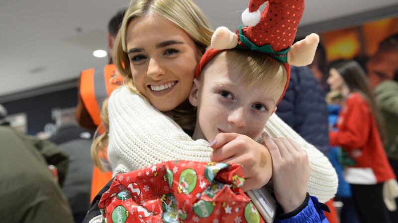 Kate Everard from Kilkenny  meets Vasili Karas at Dublin Airport. Photograph: Dara Mac Dónaill/The Irish Times