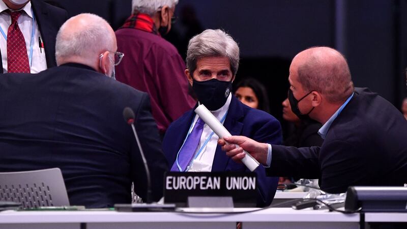 US special climate envoy, John Kerry (C) speaks with Vice President of the European Commission Frans Timmermans (L) during the Cop26 UN Climate Change Conference in Glasgow on November 13, 2021. Photograph: Ben Stansall/AFP/ Getty Images)