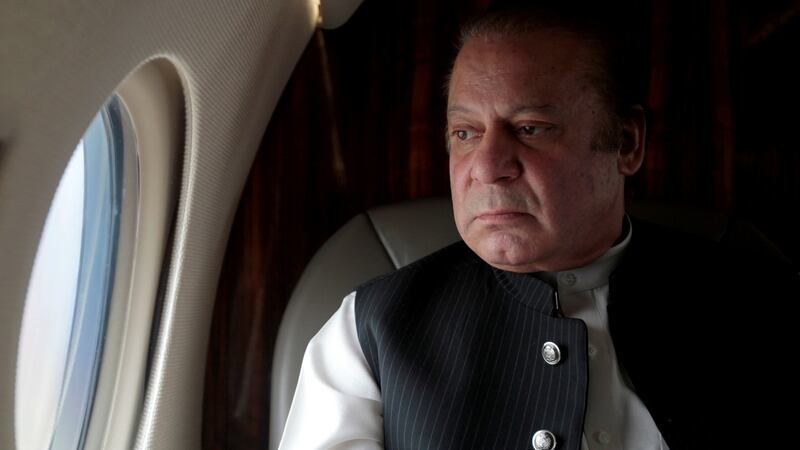Pakistani prime minister Nawaz Sharif looks out the window of his aircraft after attending a ceremony to inaugurate the M9 motorway between Karachi and Hyderabad on February 3rd, 2017. Photograph:  Caren Firouz/Reuters